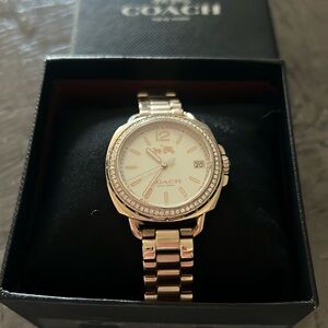 Women’s Coach watch in rose gold